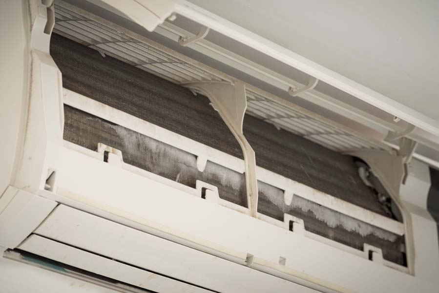ice on coil cooler of dirty air conditioner AC freezing up in Colorado