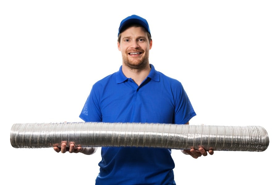 HVAC worker with flexible ventilation system tube in hands. How do I know it's time for a new furnace?