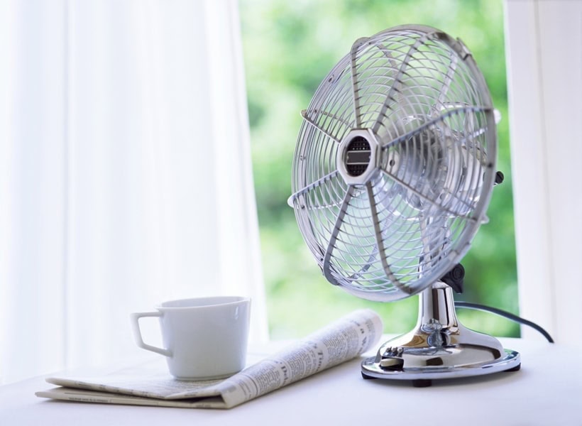 electric fun and newspaper indoor air quality