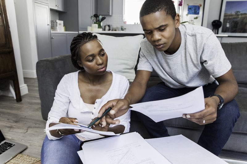 Couple Looking Over Bills