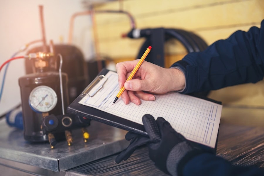 Technician Performing AC Maintenance